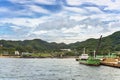 Futtsu Kanaya Interchange and sand carrier ship in front of the Mount Nokogiri. Royalty Free Stock Photo